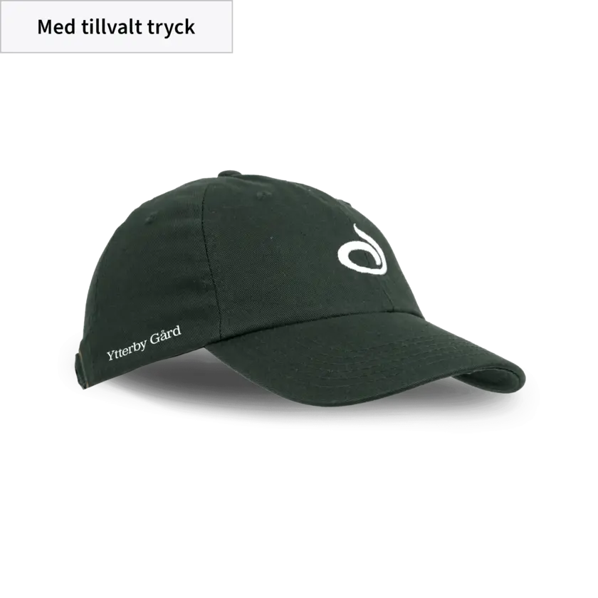grön keps med lantmännen logga och gårdsnamn
